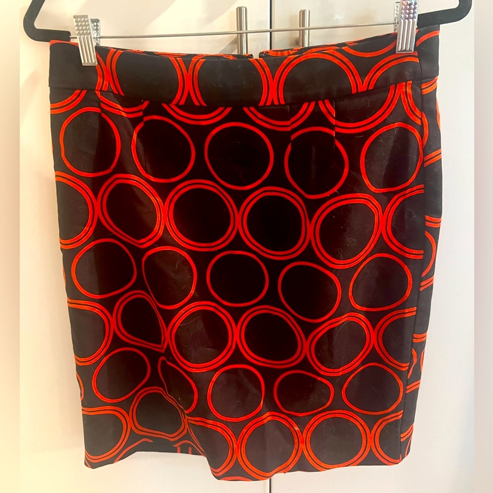 Banana Republic stretch skirt, navy with orange circular detail